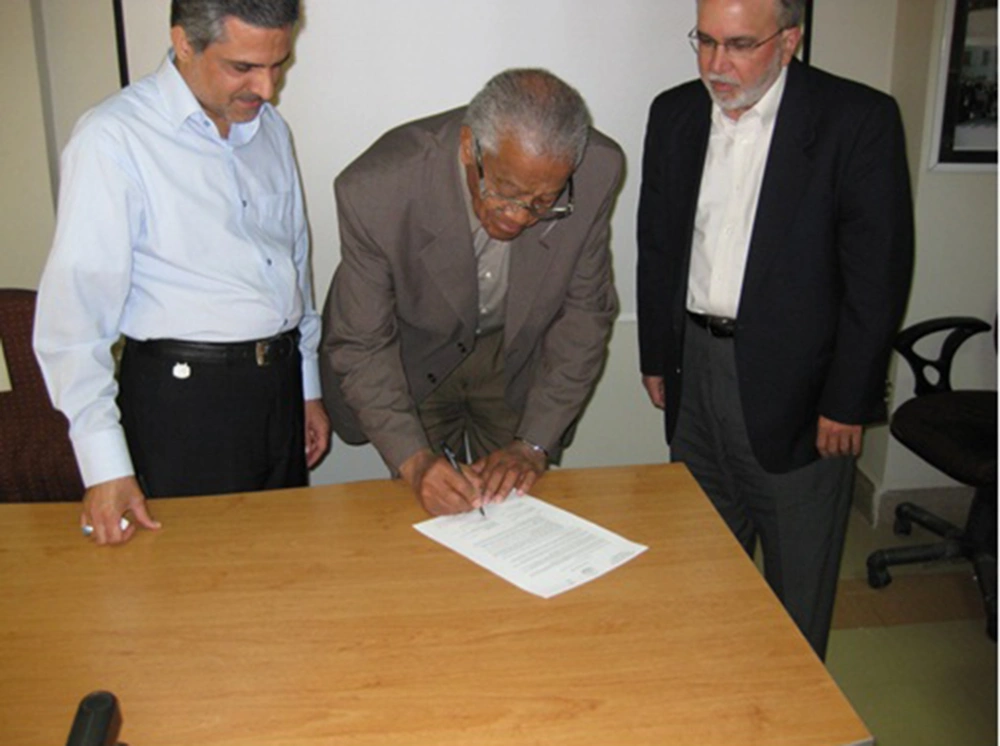 Dr. Shirley is signing Memorandum of Understanding between Jackson Medical Mall and Shiraz University of Medical Sciences for designing and implementing health house based primary health care, Iran, 2007 Dr. Shirley is signing Memorandum of Understanding between Jackson Medical Mall and Shiraz University of Medical Sciences for designing and implementing health house based primary health care, Iran, 2007